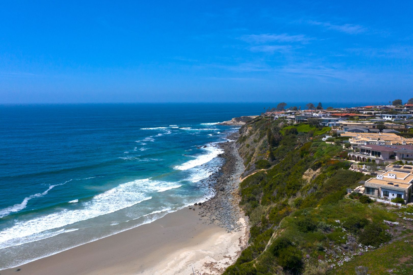 Aerial view of the Dana Point coastline, bluffs, and cliffside homes