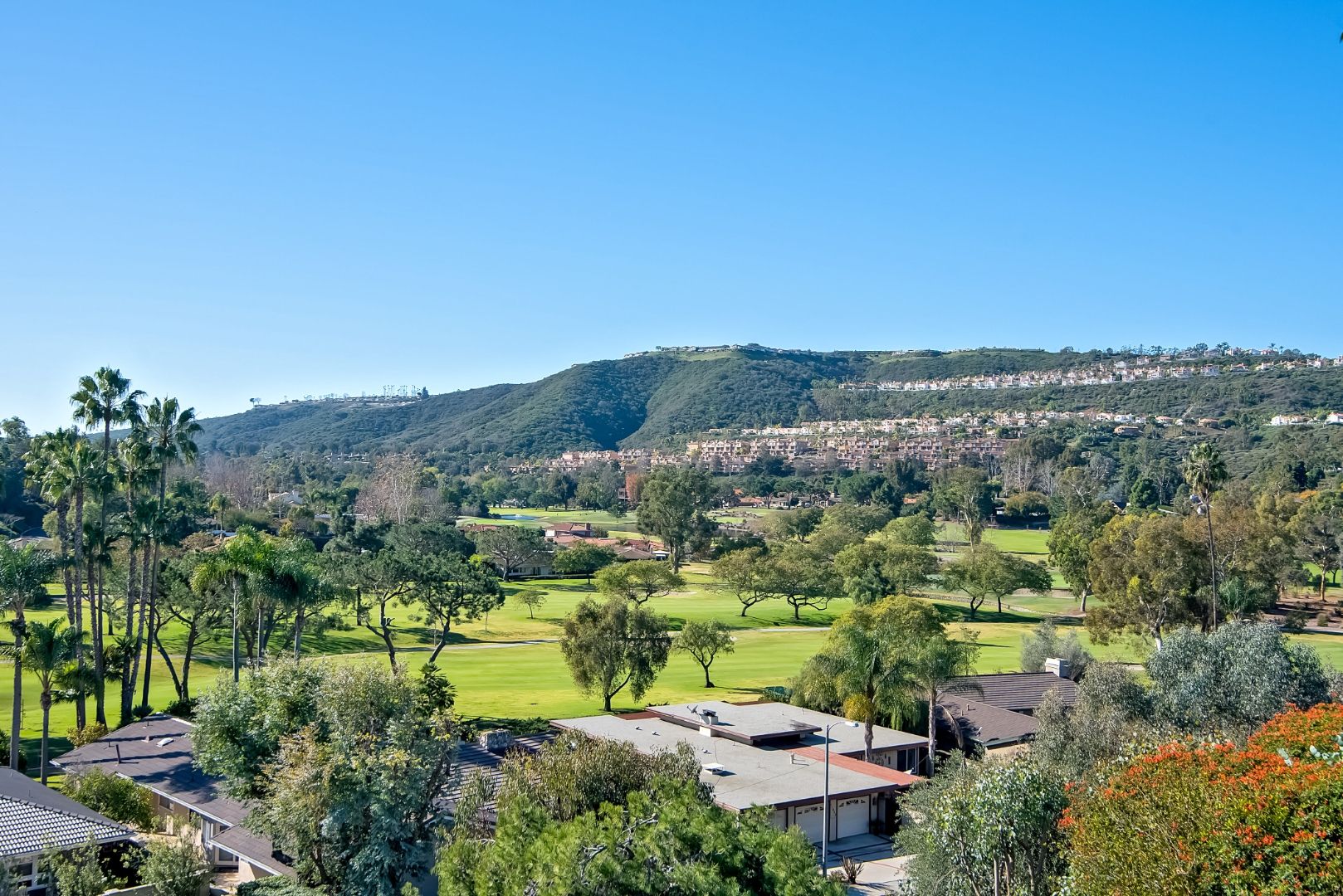 View from Hillhurst Drive in Laguna Niguel overlooking a golf course and hillside homes